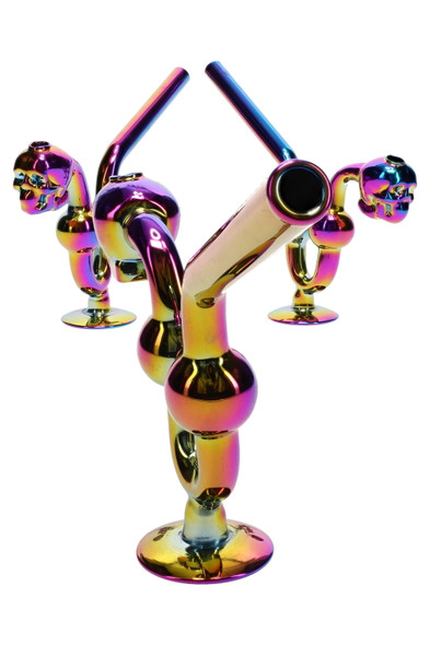 Trio of 6" rainbow metallic glass water dog oil burners with skull bowls on bases, white background—wholesale head-shop showcase view.