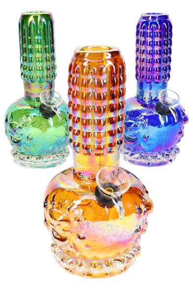 Wholesale 7-inch metallic skull soft glass water pipes, rainbow assorted colors with ribbed neck beaker bases, front group view.