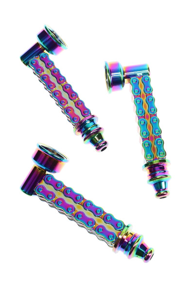 Three rainbow metallic bike-chain metal pipes on white background, compact 3.25" size with anodized finish, detailed angles for B2B retail evaluation.