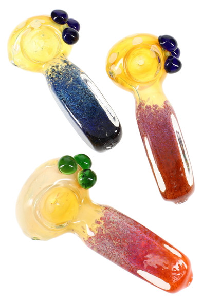 5" square-handle color-changing frit glass spoon pipes with blue, red, and orange stems and marble grips, top-down studio view for wholesale listings 5" square-handle color-changing frit glass spoon pipes with blue, red, and orange stems and marble grips, top-down studio view for wholesale listings