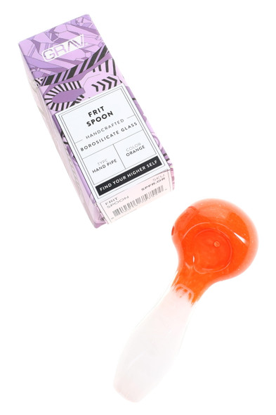 GRAV 4" frit glass spoon beside branded retail box, poppy orange colorway—wholesale smoke-shop shot emphasizing shelf-ready packaging.