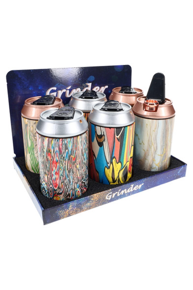 Counter display of six soda-can 2-in-1 water pipe and grinder units, assorted prints with flip-top mouthpieces, shelf-ready for smoke shops.