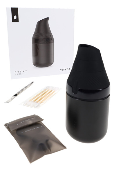 Boxed Puffco Proxy Core Kit for vape shop resale, showing black device, loading tool, swabs, and accessory pouches