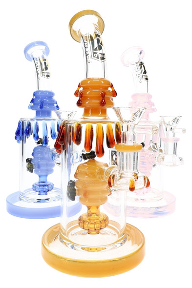 Assorted amber, blue, and pink wholesale water pipes with beehive chambers and colored honey-drip accents.
