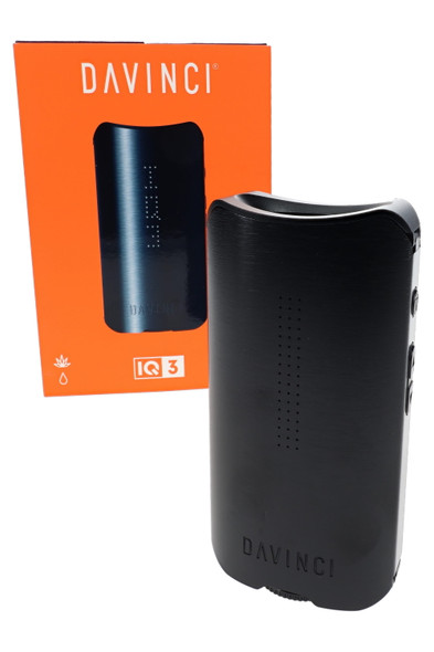 Black DaVinci IQ3 retail vaporizer with orange product box, angled front view for vape shop display