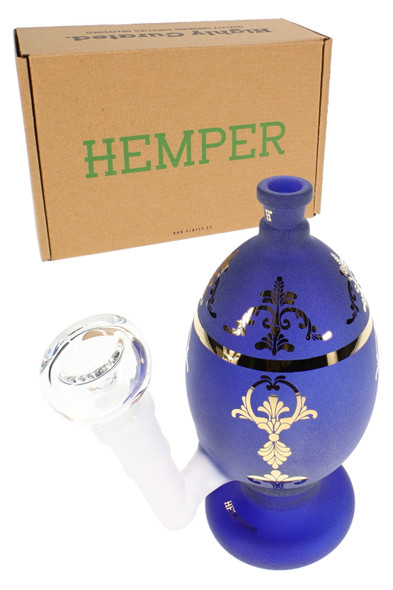 Wholesale glass bong with frosted blue jeweled egg body, clear bowl, and HEMPER retail box in angled front view