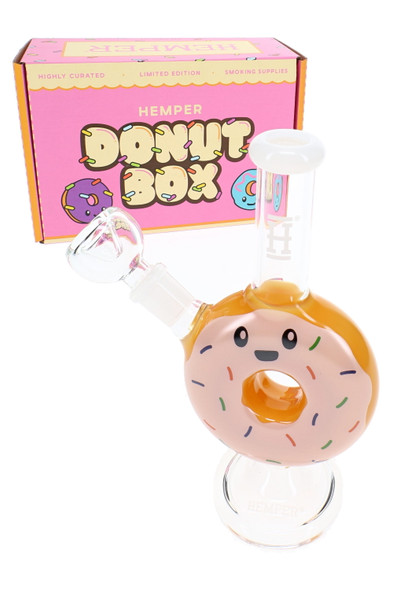 Wholesale glass bong shaped like a yellow donut with white icing, sprinkle decals, and HEMPER retail box