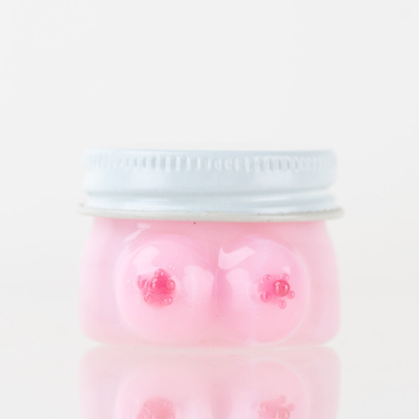 Pink 1.5" Empire Glassworks Boobies terp jar for wholesale smoke shop displays with silver lid