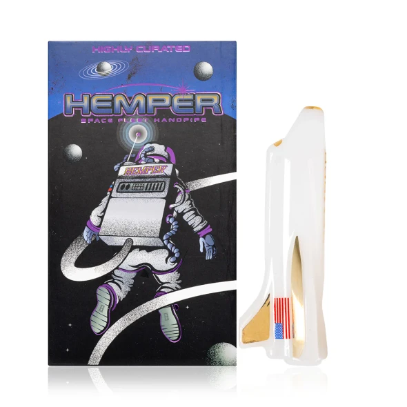 Hemper Space Shuttle Hand Pipe beside Space Fleet retail box with astronaut artwork and planet graphics