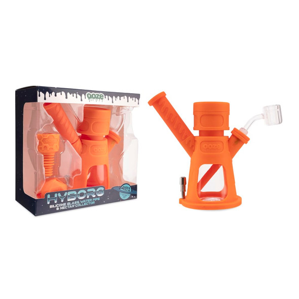 Ooze Hyborg Orange Burst silicone and glass hybrid water pipe displayed beside branded retail box