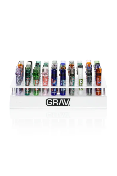 Front view of GRAV acrylic display holding rows of assorted 16 mm Whimsical Tasters with marble roll stops