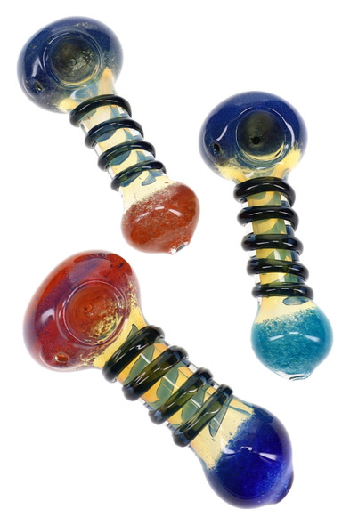 Three 5" glass spoon pipes with blue or red frit bowls, colored mouthpieces, and dark raised coils around the stems