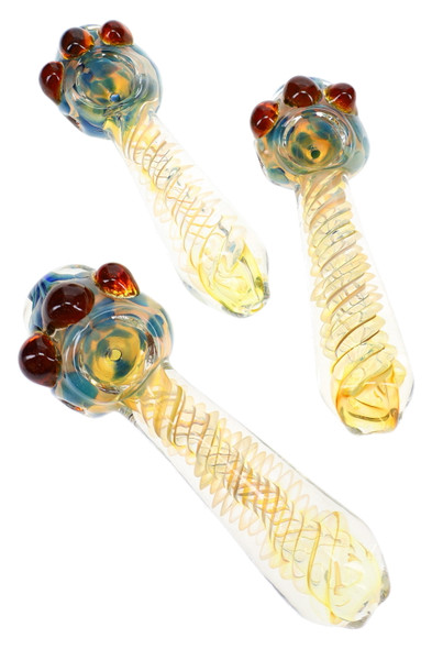Three 5.5" glass spoon pipes with amber spiral linework, blue bowl accents, and raised reddish glass marbles