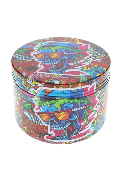 2.5" decal grinder with colorful blue skull and sunglasses artwork wrapping around the round exterior