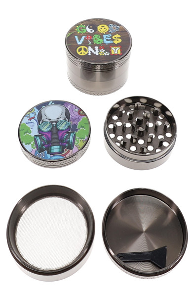 4-part metal grinders opened to show teeth, screen, scraper and colorful illustrated decal lid designs
