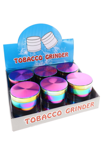 Six rainbow 2.5" metal windowed grinders arranged in a countertop retail display box for smoke shop merchandising