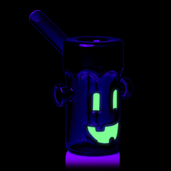 Side UV view of MJ Arsenal Frankenbubbler with angled glass mouthpiece, black upper section, and glowing face details