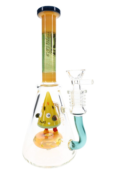 6B Glass beaker water pipe with a yellow triangular character, orange neck accents, teal side connection, and clear bowl.