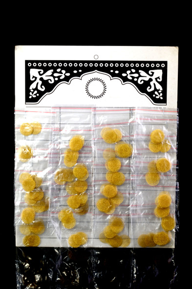 Wholesale brass pipe screen display card holding 36 bags of 15 mm screens, front-on studio view for retail buyers