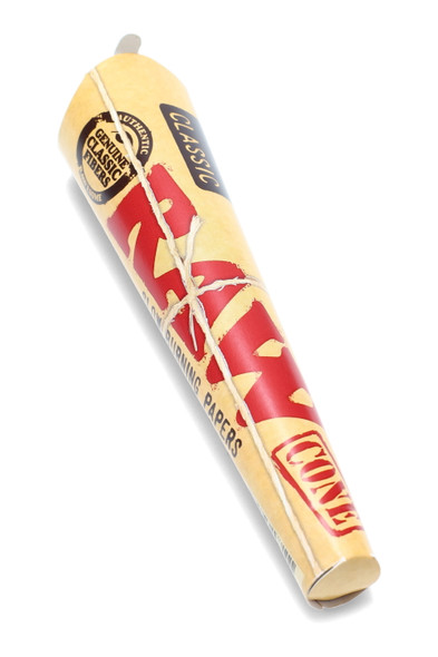 Wholesale RAW King Size pre-rolled cones 3-pack, natural unbleached paper with tips, sealed retail pouch, top-angled close-up on white.