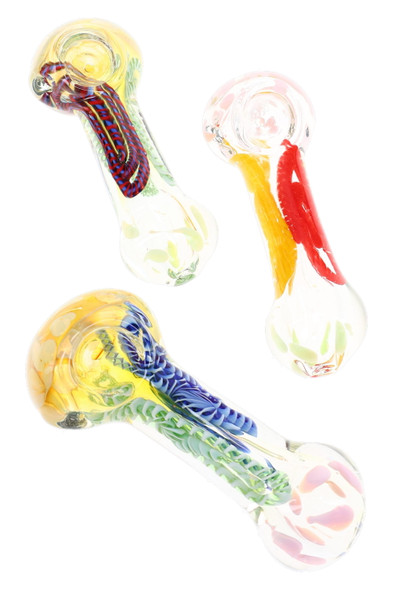 Three color-changing glass pipes with varied multicolor stripe and dot designs shown together on white