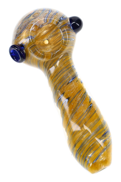 Amber-toned frit glass spoon pipe with fine striped detailing and dark blue raised glass accents around the bowl