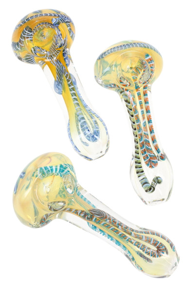 Wholesale 4" color-changing striped glass spoon pipes, clear body with multicolor cane work, assorted variants, top-down trio view for showcases. Wholesale 4" color-changing striped glass spoon pipes, clear body with multicolor cane work, assorted variants, top-down trio view for showcases.