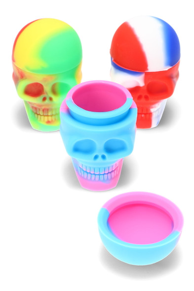 Wholesale 15 ml silicone skull concentrate jars, assorted multicolor swirls, open and closed views, non-stick interior, product group studio shot