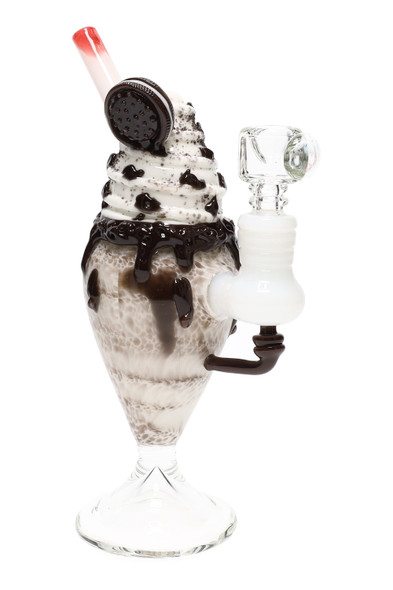 Front studio view on white showing whipped “cream,” drizzle details, cookie accent and stemless base; wholesale mini rig with 14.5 mm female joint. Front studio view on white showing whipped “cream,” drizzle details, cookie accent and stemless base; wholesale mini rig with 14.5 mm female joint.