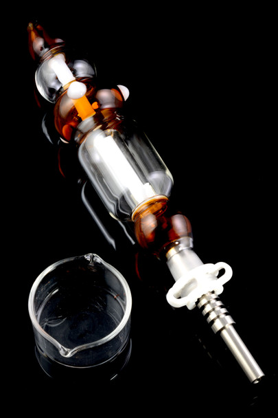 Wholesale 10″ colored glass dab straw kit with 14.5 mm female joint, titanium tip and glass tray, angled black-background studio view.