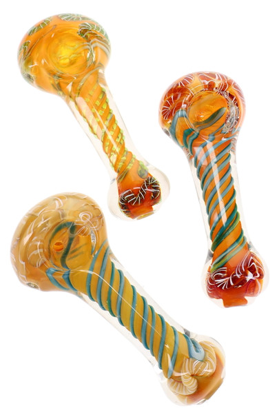 Assorted clear glass spoon pipes with orange and teal twisted spiral accents, decorative worked cane ends, and rounded bowls in multiple color variations.