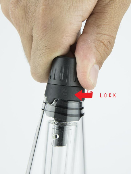 Close-up hand turning mouthpiece to LOCK; red arrow shows sealed position on Travel Glass—ideal head-shop travel upsell visual.