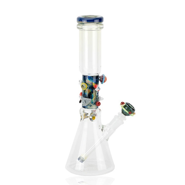 White-background product view of 14" Empire Glassworks galactic beaker, clear base and blue lip wrap; retail smoke gear, right-front angle. White-background product view of 14" Empire Glassworks galactic beaker, clear base and blue lip wrap; retail smoke gear, right-front angle.