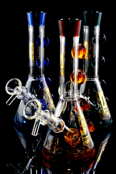 Assorted 7.5" wholesale water pipes on black background with blue, amber, and teal accents and clear bowls.