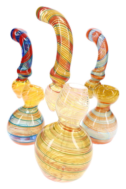 Assorted medium color-changing Sherlock glass bubblers with multicolor spiral striped designs for retail glass displays.