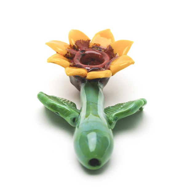 Front view of sunflower sherlock pipe with green mouthpiece, raised leaves, and flower bowl