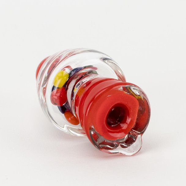 Top-down close-up showing red mouthpiece and clear dome of gumball glass bubble cap, multicolor beads visible, wholesale dab rig accessory.