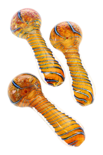 Trio of 4" color-changing glass spoon pipes with gold-fumed frit bowls and blue spiral stripes; overhead studio view for wholesale head-shop catalogs. Trio of 4" color-changing glass spoon pipes with gold-fumed frit bowls and blue spiral stripes; overhead studio view for wholesale head-shop catalogs.