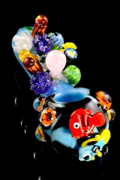 Top view of blue reef spoon pipe with red fish, yellow fish, coral accents, and bowl detail