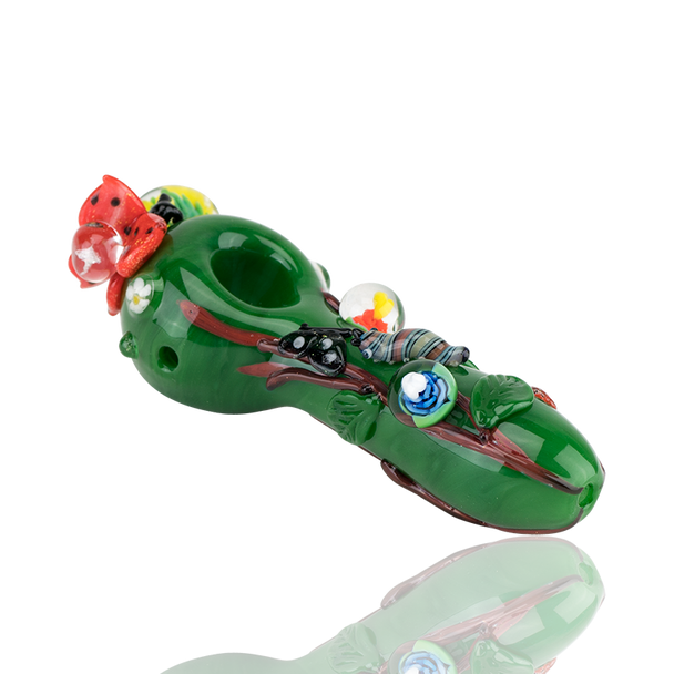 Side three-quarter studio image for wholesale listings—4.5" green spoon pipe with ant, snail, leaf appliqués and multicolor marble details.