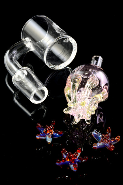 Accessory set for head-shop buyers: 14.5 mm quartz banger, UV jellyfish carb cap, and three starfish terp pearls on glossy black backdrop.