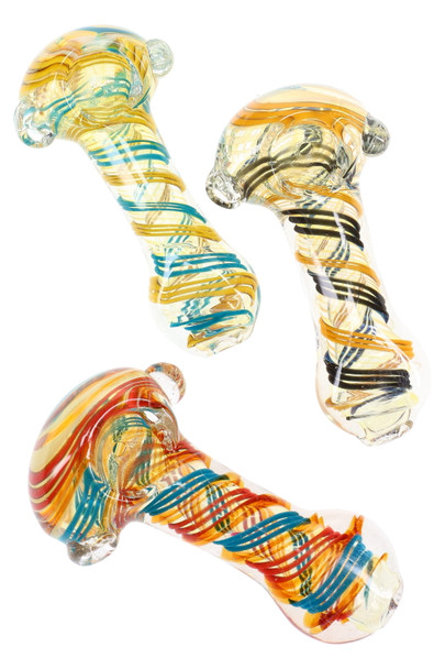 Wholesale 4" color-changing glass spoon with multicolor swirl striping, clear body, assorted variants, trio overhead product view ideal for retail cases. Wholesale 4" color-changing glass spoon with multicolor swirl striping, clear body, assorted variants, trio overhead product view ideal for retail cases.
