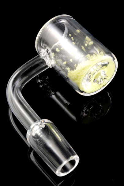 14.5 mm male thermochromic quartz banger with 25 mm cup; wholesale head-shop part, yellow media visible, angled close-up on glossy black.