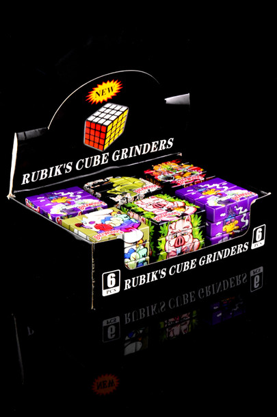 Rubik’s Cube grinder 6-count display with assorted alien and critter graphics; wholesale-ready presentation, angled view.