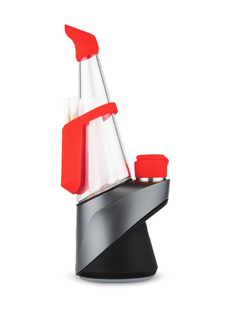 Peak Pro with red silicone Travel Pack installed, left side angle—retail smoke-shop accessory highlighting backpack and cap tether.