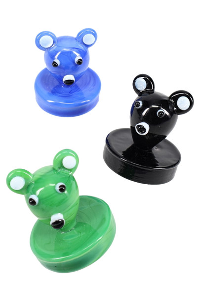 Three glass koala carb caps in blue, black, and green with round bases; wholesale dabbing accessory, front-facing group view on white background.