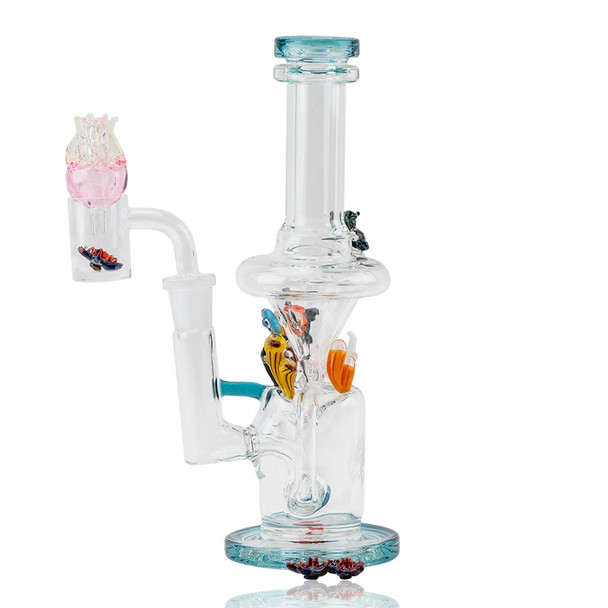 Right-side angle showing stacked recycler chambers and turtle; clear base with reef elements for B2B product detail.