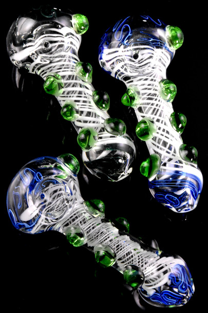 Bulk purchase clear glass spoons with stripes for head shop resale.