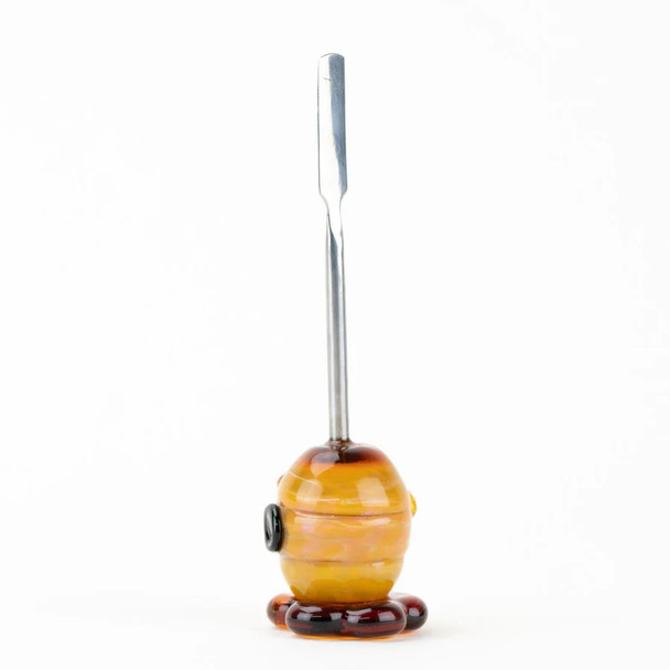 Amber beehive glass base with flat metal blade tip, approx. 4"; compact dab tool for wholesale head-shop displays, straight front angle on white.