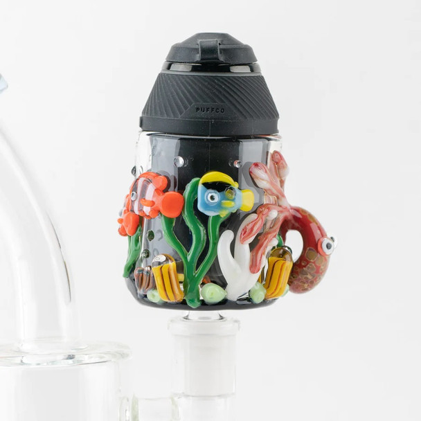 Under the Sea Proxy attachment installed; Puffco core seated in reef cup with 14.5 mm male joint, ideal for head-shop displays.